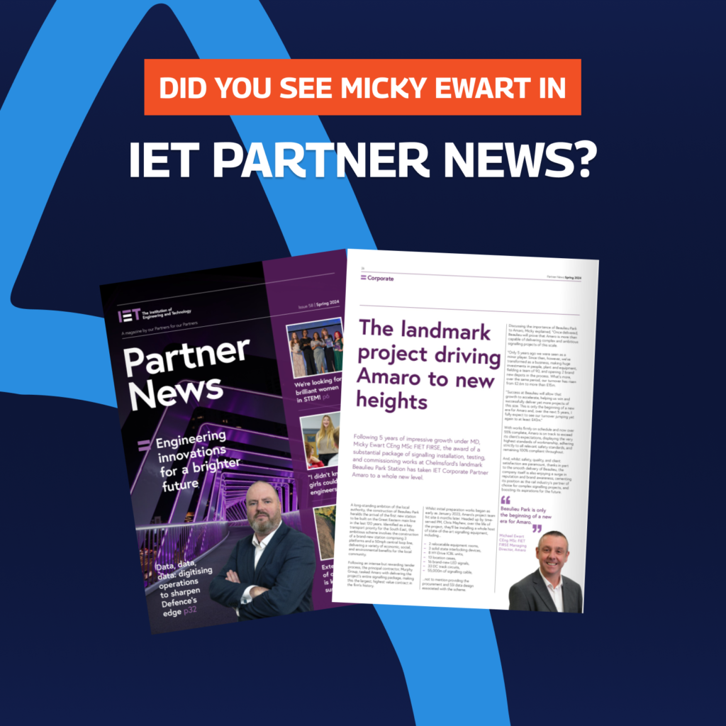 This image showcases a promotional graphic for IET (Institution of Engineering and Technology) Partner News. The main text asks, “Did you see Micky Ewart in IET Partner News?” in bold white and orange lettering against a blue background. The image features two magazine pages side by side. On the left, the cover of “IET Partner News” is displayed with the headline “Engineering innovations for a brighter future” and a picture of a man with folded arms. On the right, an article titled “The landmark project driving Amaro to new heights” is shown, highlighting the achievements of Micky Ewart and a major project under his leadership at Amaro. There is a photo of a smiling man at the bottom right corner of the article.