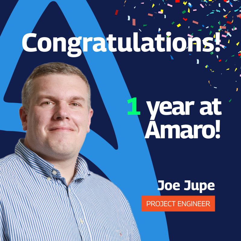 A celebratory graphic congratulating Joe Jupe on his 1-year anniversary at Amaro. The image features a professional portrait of Joe, positioned on the left, with colorful confetti in the top right corner. The text “Congratulations! 1 year at Amaro!” is prominently displayed in bold white and green letters. Below, Joe’s name and title, “Project Engineer,” are shown in bold white text with an orange label. The background includes a blue design element on the left side.