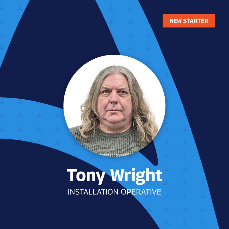 A welcoming graphic introducing Tony Wright as the new Installation Operative. The image features a headshot of Tony, centered within a circular frame. The background design is a modern mix of dark blue and light blue with a subtle pattern. An orange label in the top right corner reads “NEW STARTER.” Tony’s name and job title are displayed in bold white text below the portrait.