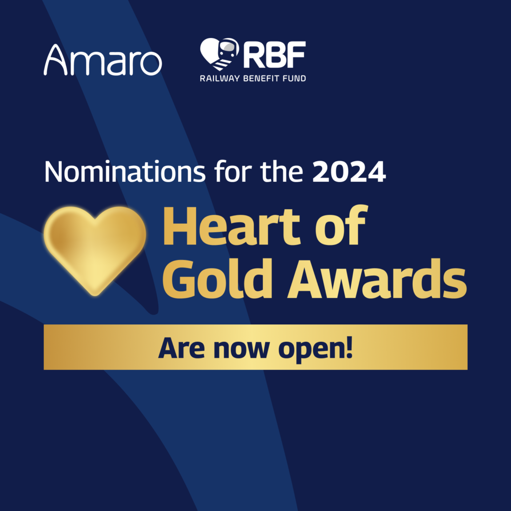 The image is a promotional graphic for the 2024 Heart of Gold Awards, with nominations now open. It features a dark blue background with the Amaro and Railway Benefit Fund (RBF) logos at the top. A large golden heart is in the center, emphasizing the award’s theme. Text on the image invites viewers to “Cast your vote in the comments,” indicating an interactive nomination process. The design uses gold and blue colour tones, giving it a distinguished and professional appearance.